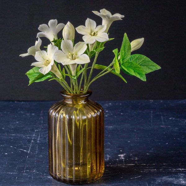 A vase of sugar flower Petunias 